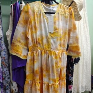 Imported satiny dress size fits l yellow and white